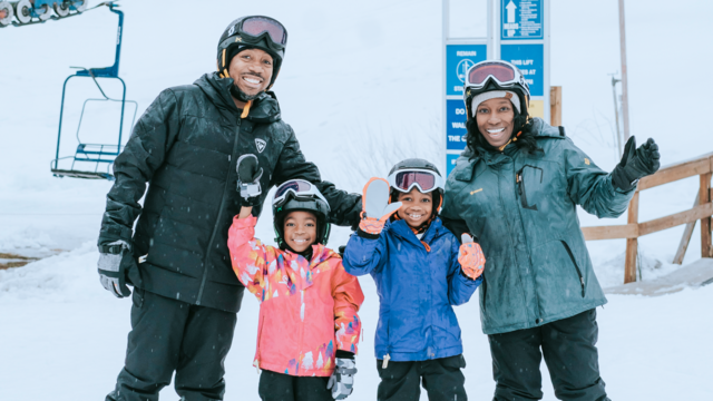 Wish kid Iris and her family play in the snow