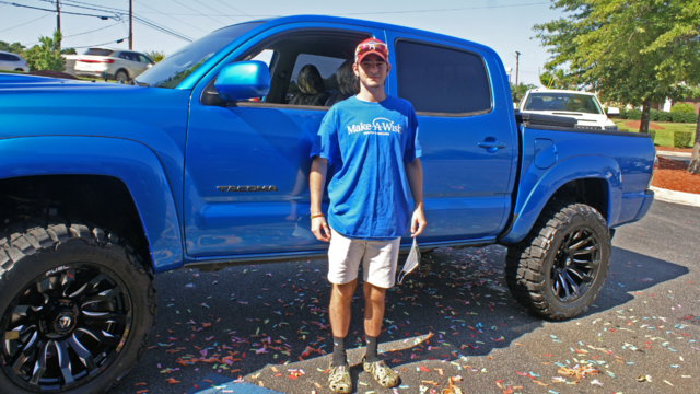 Michael poses in front of his revamped truck.