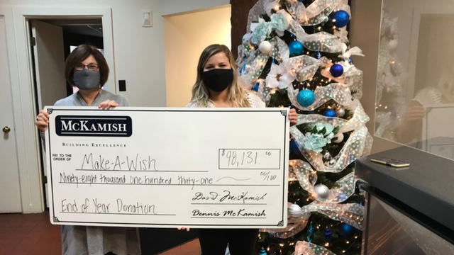 Pictured here are Stephanie Pugliese, Make-A-Wish Development Director with Naley McKamish, McKamish Director of Marketing with a donation.