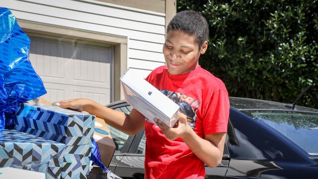 Javares Opening Gifts on Wish Day