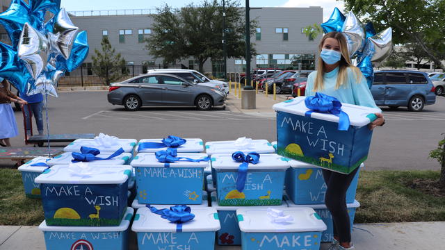 Lauren with her boxes of comfort for the kids at Dell Children's Medical Center.