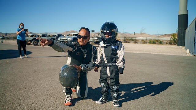 Gerold learns the ins and outs of the racetrack from SpeedVegas driver, Cole