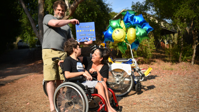 Elijah and parents on wish day