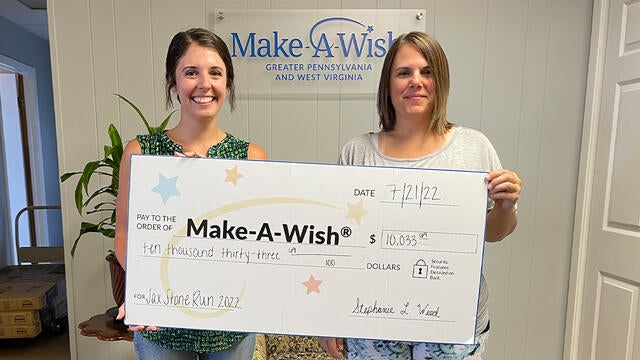 Pictured here are Make-A-Wish Erie regional manager Courtney Nientimp and Jax Stone event organizer Stephanie Weed with her donate to wishes.