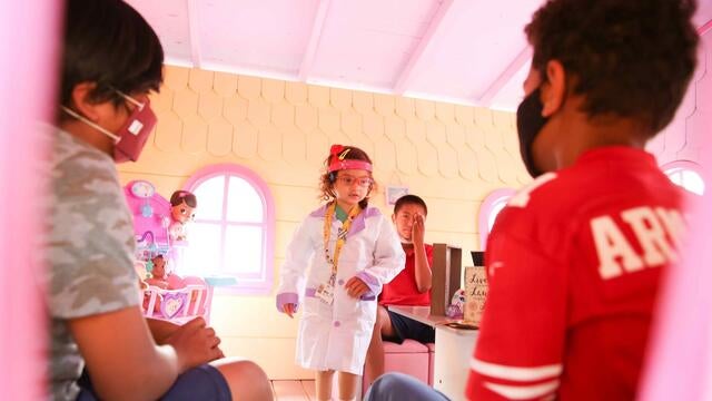 Dr. Penny seeing patients