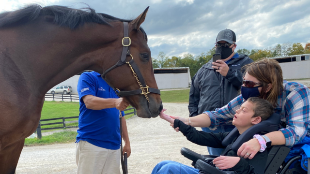 Photo of wish kid Cody with the horse Cody's Wish