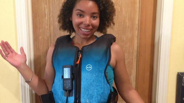 Ashley with her breathing treatment vest
