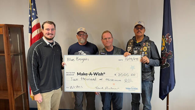 Blue Knights Chapter XVI check presentation to Make-A-Wish Development Coordinator, Jake Seavy