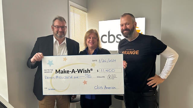 Lorenz Praefcke, CEO of cbs America, Ann Waltman, Make-A-Wish York Regional Senior Director and Johannes Semel vice president of cbs America.