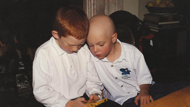 Ben playing video games with a friend during Ben's treatment