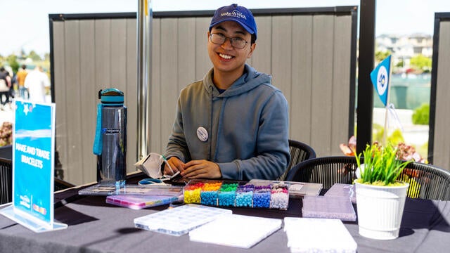 Wish alum Justin led the make-and-trade friendship bracelet station.