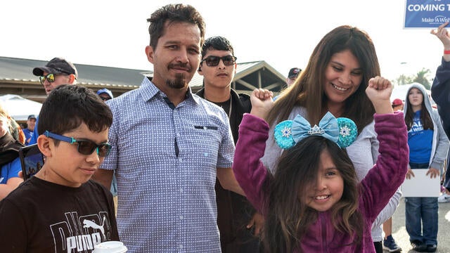Wish kid Bridget with her family