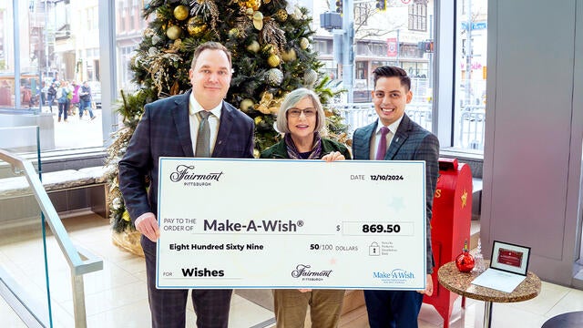 General Manager Shawn St.-Pierre and Public Relations Manager, Christopher Ramirez with Stephanie Pugliese, Make-A-Wish development director.