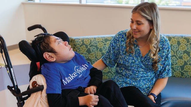 Alyssa talking to Wish Kid Reison