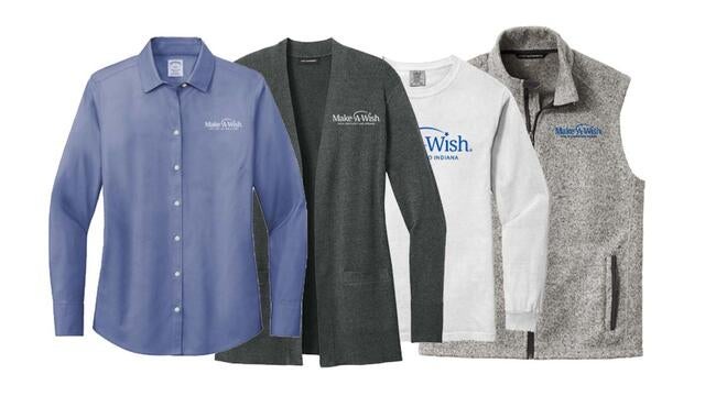 Assortment of apparel featuring the Make-A-Wish logo, including a light blue button-down shirt, a charcoal gray cardigan, a white long-sleeve tee, and a gray fleece vest.