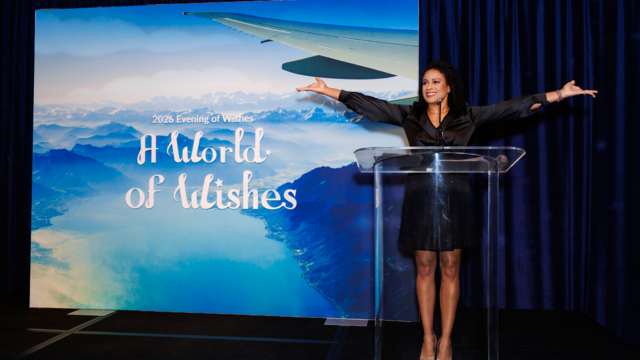 Ama welcoming guests at Evening of Wishes: A World of Wishes