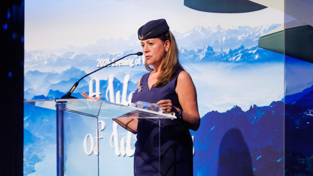 CEO Betsy Biern giving remarks at Evening of Wishes: A World of Wishes