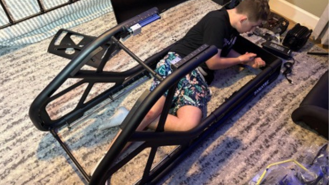 Ethan assembling the simulator