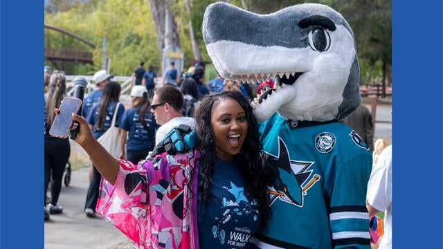 KRON4's Reyna Harvey with San Jose Sharks mascot Sharkie