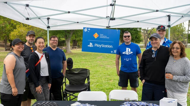 Sony Interactive Entertainment | PlayStation team members at their tent