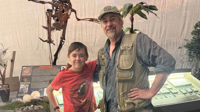Ian posing with his dino dig guide, Walter
