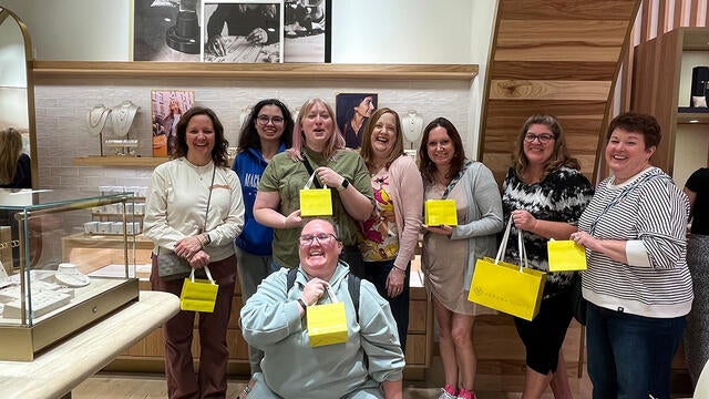 Employees of PNC Wealth Management at Kendra Scott at Ross Park Mall.
